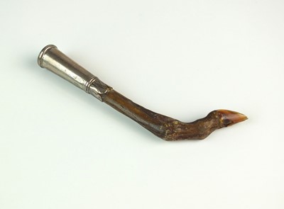 Lot 67 - A late 17th/early 18th century silver mounted pygmy deers foot pipe tamper