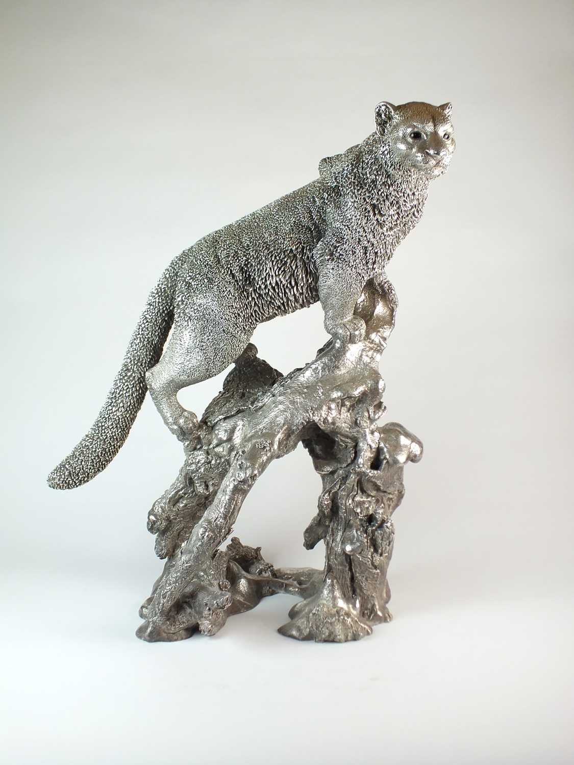 Lot 10 - An impressive Elizabeth II silver model of a snow leopard by Mappin & Webb