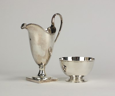 Lot 3 - A silver cream jug and a sugar bowl