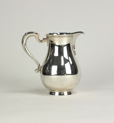 Lot 7 - A Goldsmiths & Silversmiths Co Ltd silver baluster jug