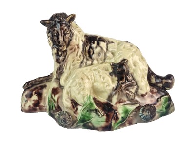 Lot 251 - English or Scottish figure of a recumbent ewe with a lamb, circa 1800