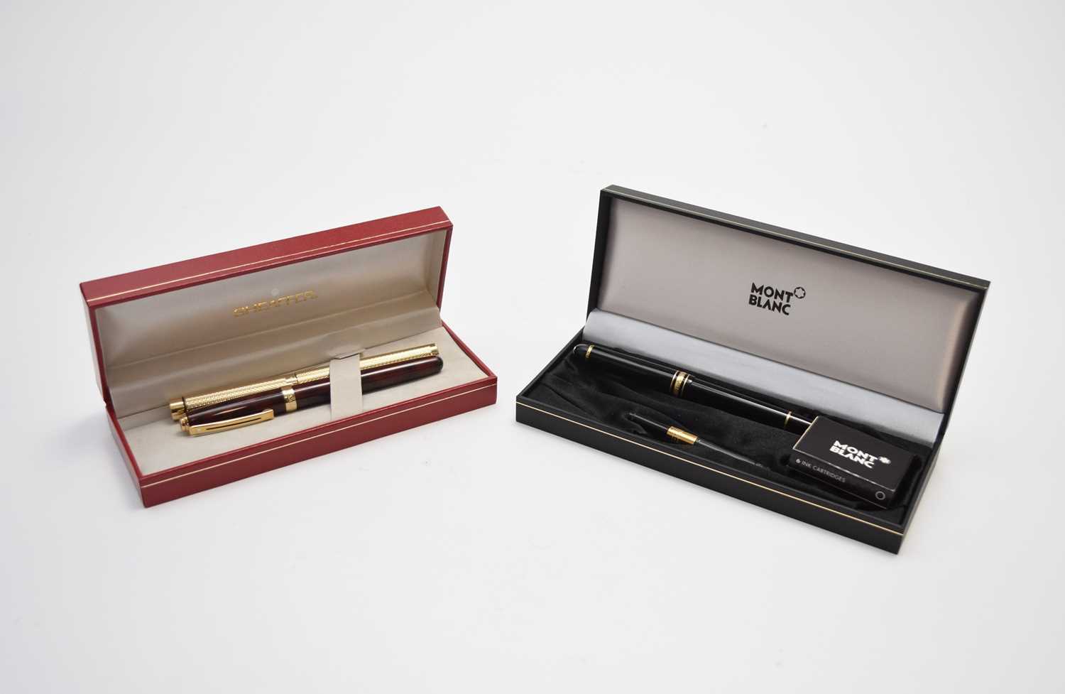 Lot 61 - A Mont Blanc fountain pen and two Sheaffer fountain pens