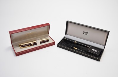 Lot 61 - A Mont Blanc fountain pen and two Sheaffer fountain pens