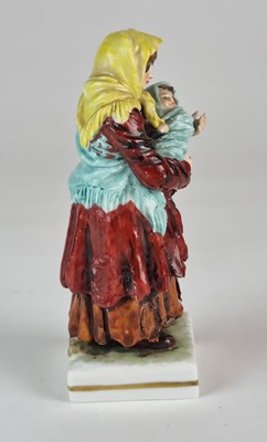Lot 273 - German porcelain figure of Russian peasant woman with baby, 19th century