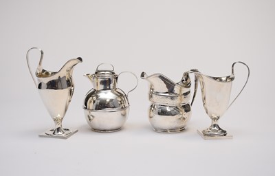 Lot 16 - Four silver jugs