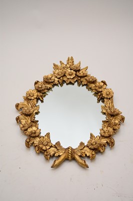 Lot 603 - A giltwood oval wall mirror