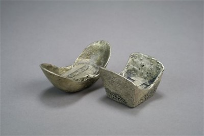 Lot 387 - Two Chinese sycee ingots and two Chinese gilt ingots (4)