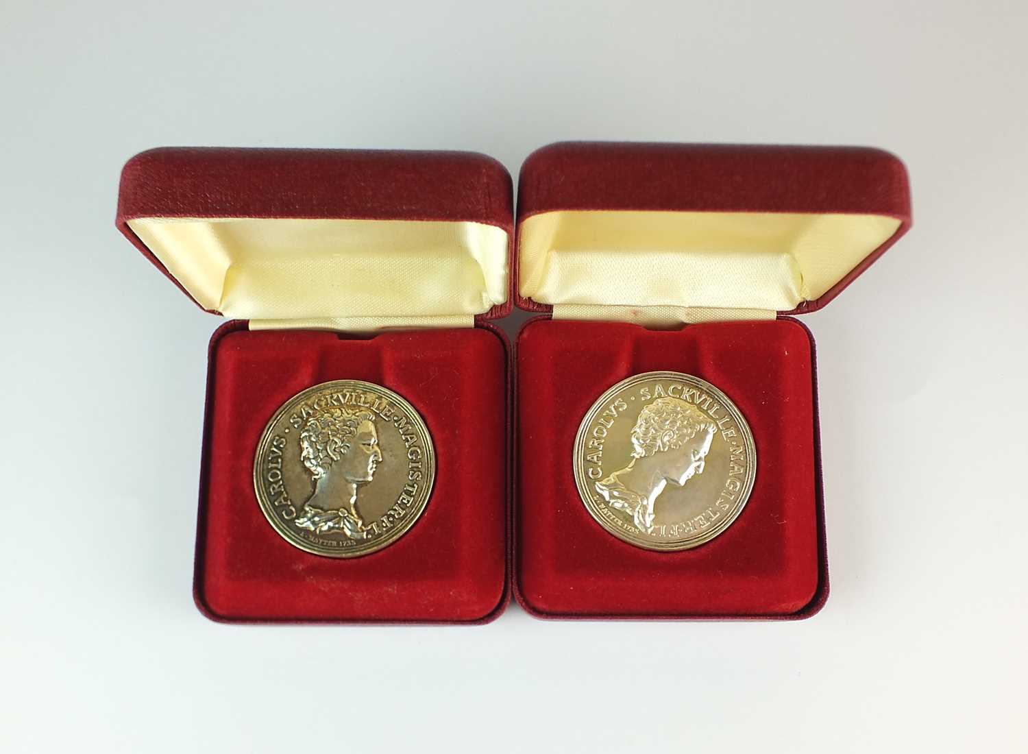 Lot 154 Two pairs of sterling silver medallions