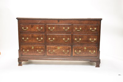 Lot 517 - A late 18th century oak mule chest