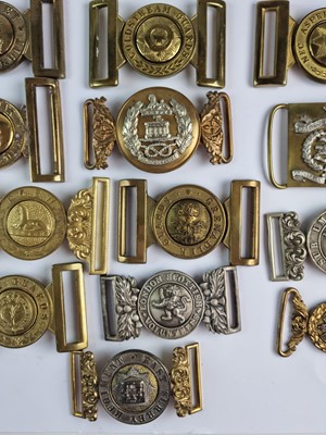 Lot A collection of fifteen brass and white metal...