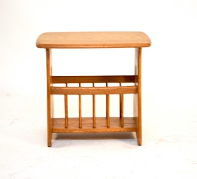 Lot 577 - An Ercol blond ash magazine rack