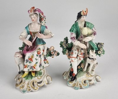 Lot 222 - Pair of Derby figures of a bagpipe player and a lady with lute