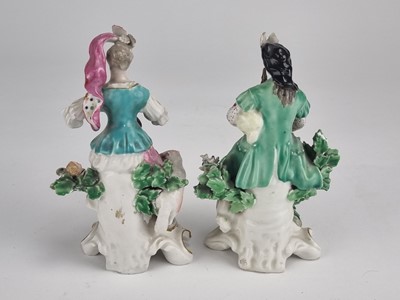 Lot 222 - Pair of Derby figures of a bagpipe player and a lady with lute