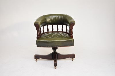 Lot 588 - A leather upholstered 'captains' type office chair
