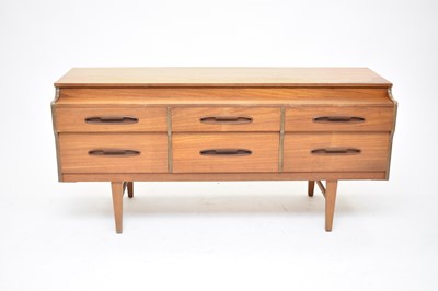 Lot 575 - A mid-century teak sideboard
