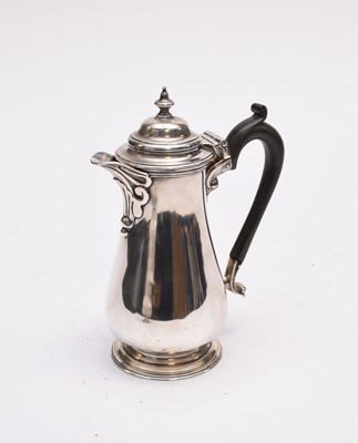 Lot 47 - A George V silver hot water jug