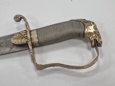 Lot 221 - An Indian-made sabre and scabbard with horse head handle