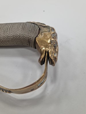 Lot 221 - An Indian-made sabre and scabbard with horse head handle