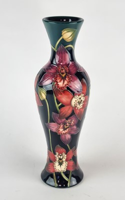 Lot A tall Moorcroft vase in the 'Portelet Bay'...