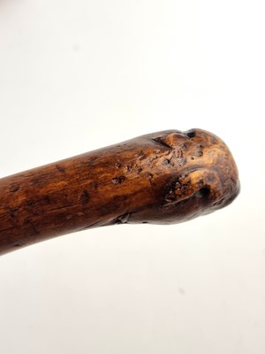 Lot Victorian sword cane with a handle carved as a dog with red glass eyes