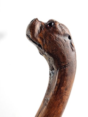 Lot Victorian sword cane with a handle carved as a dog with red glass eyes