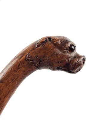 Lot Victorian sword cane with a handle carved as a dog with red glass eyes
