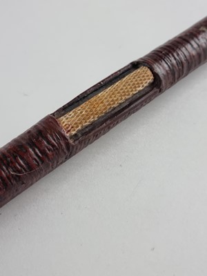 Lot An unusual Indian sword cane, circa 1900, decorated with a snake