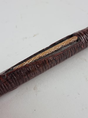 Lot An unusual Indian sword cane, circa 1900, decorated with a snake