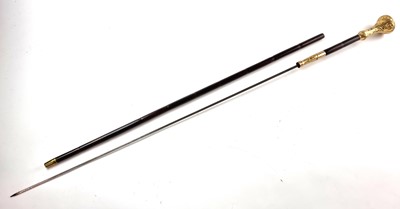 Lot Victorian gentleman's sword with gilt metal pommel and collar