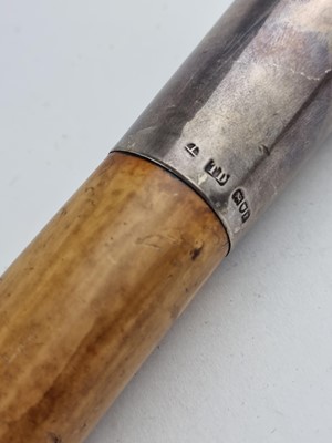 Lot Malacca sword cane with London silver top, hallmarked 1912