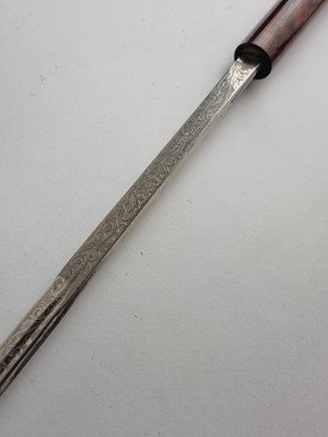 Lot A late 19th/early 20th-century hardwood sword cane with Toledo blade