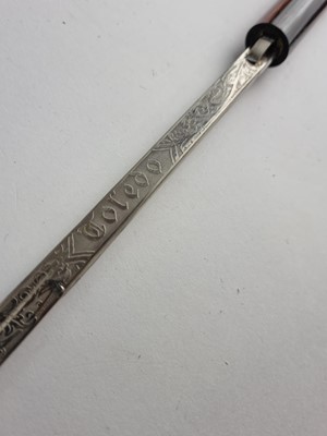 Lot A late 19th/early 20th-century hardwood sword cane with Toledo blade