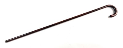 Lot A late 19th/early 20th-century hardwood sword cane with Toledo blade