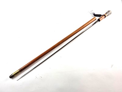 Lot Early 20th-century gentleman's malacca walking cane with Indian-style pommel