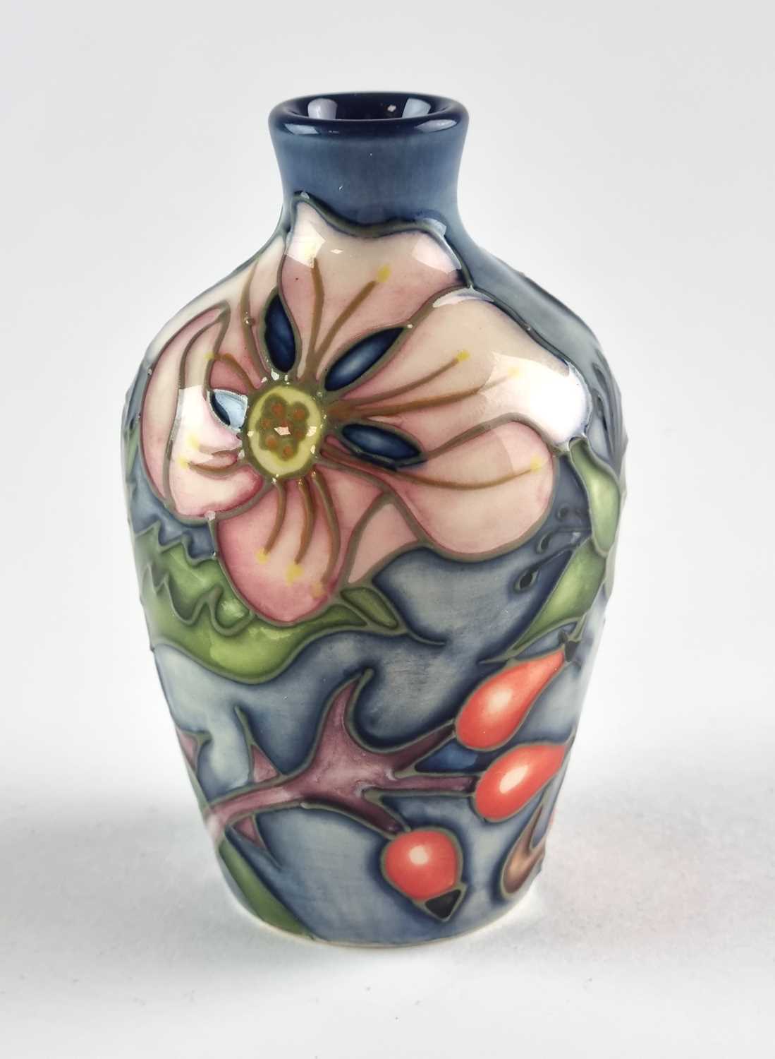 Lot A miniature Moorcroft vase designed by Jeanne McDougall