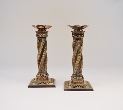 Lot 13 - A pair of silver plated candlesticks