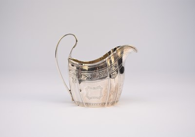 Lot 10 - A George III Irish silver milk jug