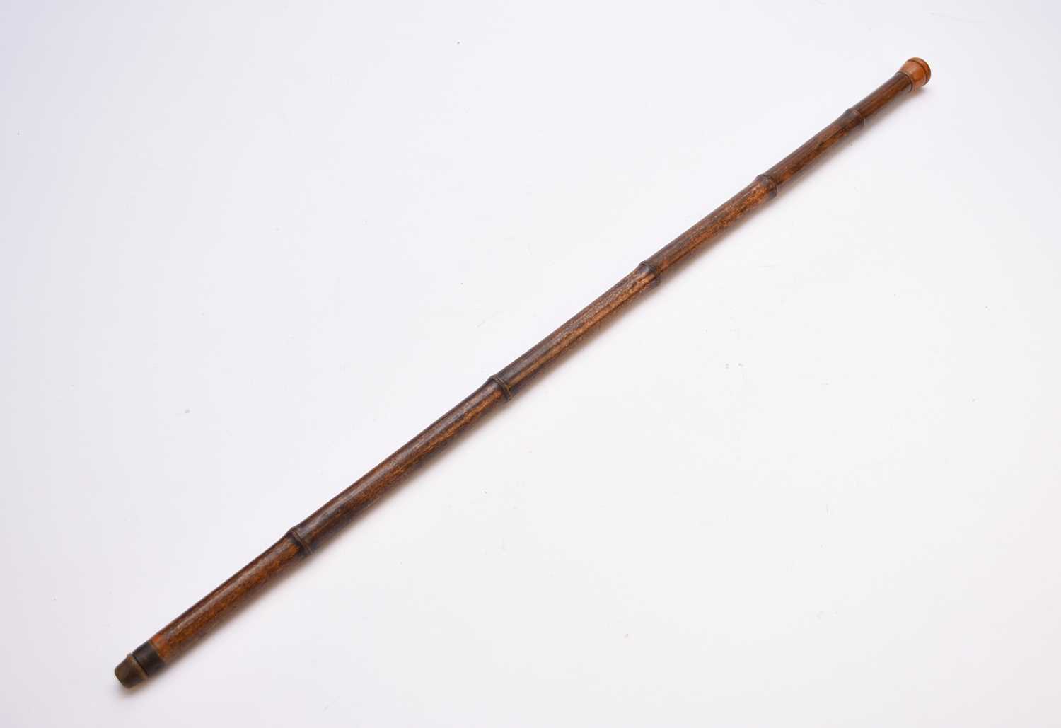 An early 20th century bamboo walking stick, possibly a 'drinking' example