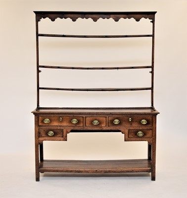 Lot 393 - An early 19th century South Wales oak dresser and rack