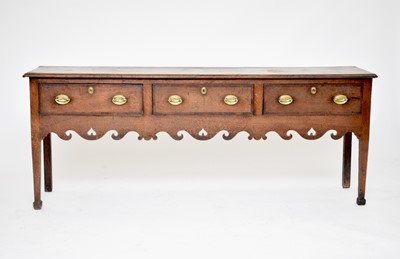 Lot 330 - An 18th Century oak and mahogany crossbanded dresser base, West Midlands