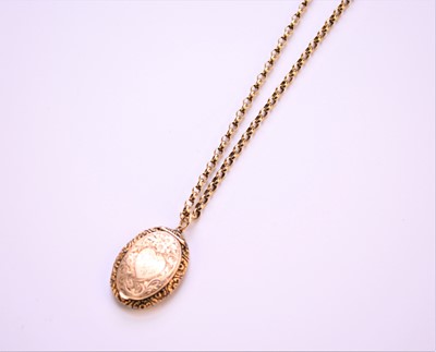 Lot 62 - A yellow metal oval locket on chain