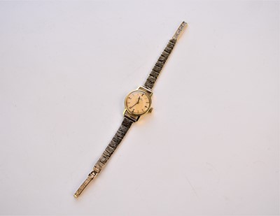 Lot 103 - Gerard Perregaux: A lady's 18ct gold wristwatch on 9ct bracelet