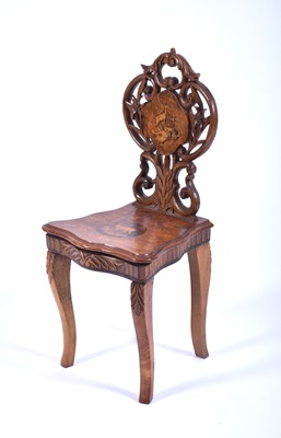 Lot 309 - A Black Forest inlaid walnut musical chair