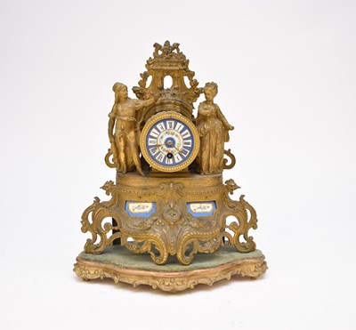 Lot 374 - A French gilt metal and porcelain-mounted mantel timepiece
