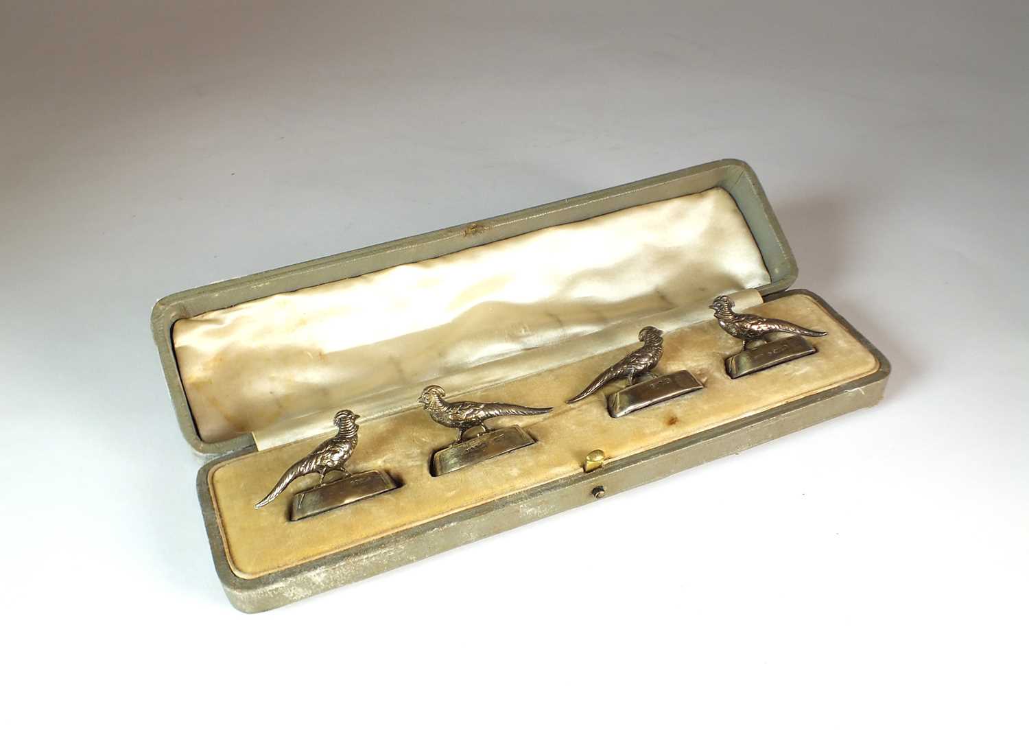 Lot 6 - A cased set of George V silver mounted menu holders
