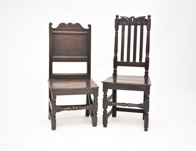 Lot 437 - A 17th/18th century oak panel back chair and an oak high back chair (2)