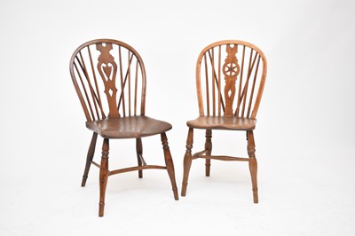 Lot 438 - Two yew wood and elm hoop-back chairs