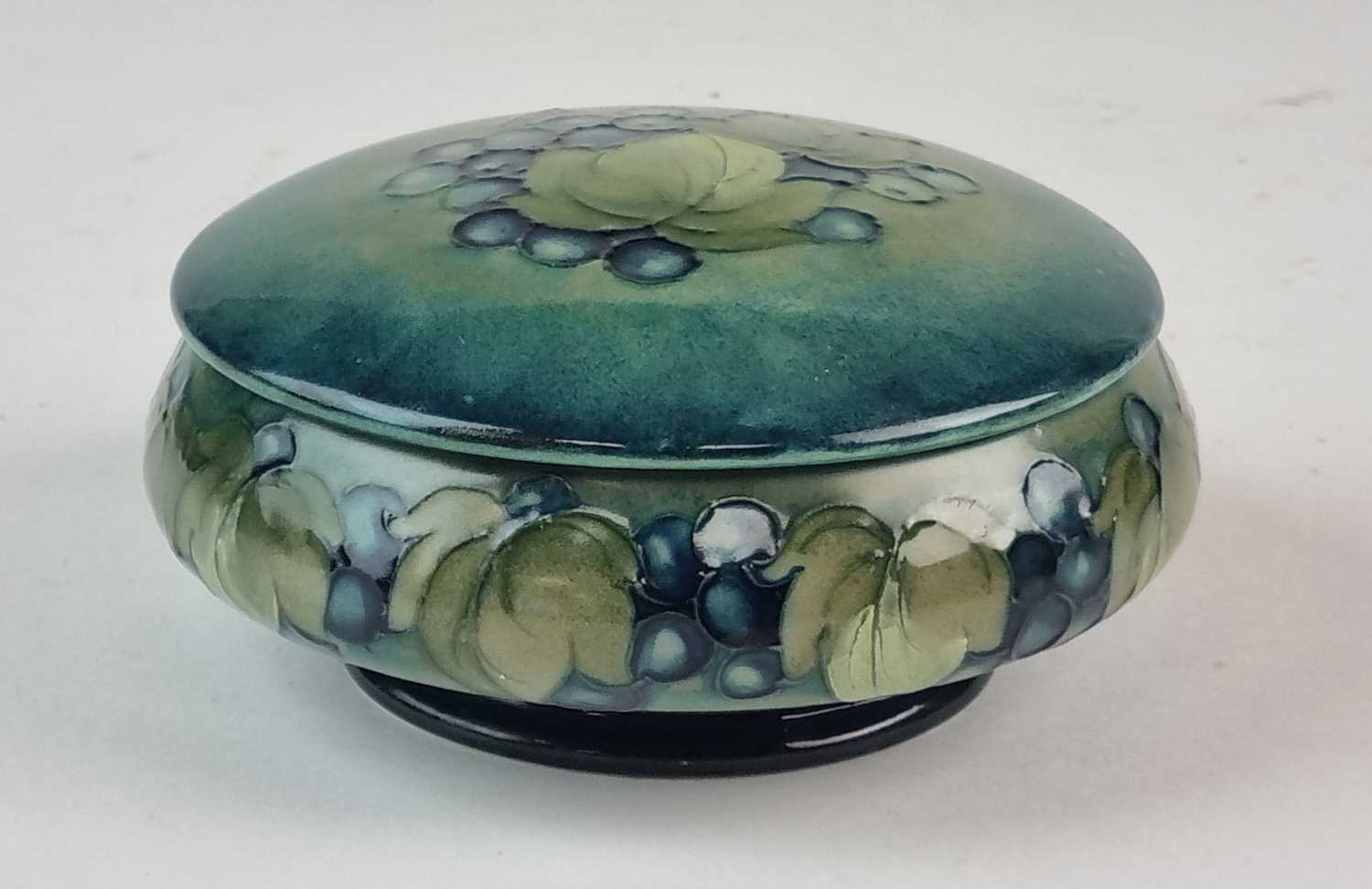 Lot Walter Moorcroft 'Leaf and Berry' circular pot and cover