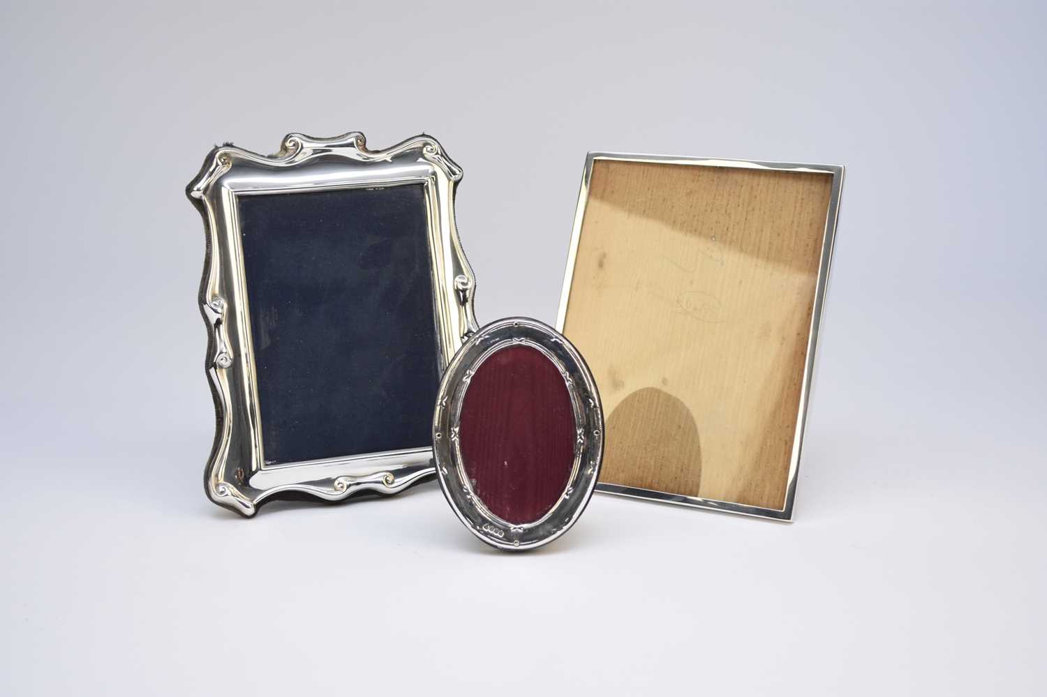 Lot 28 - Three silver mounted frames