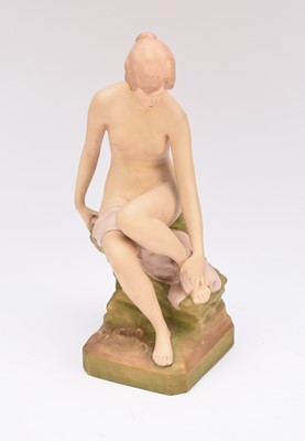 Lot 218 - A Royal Dux nude study of a female bather